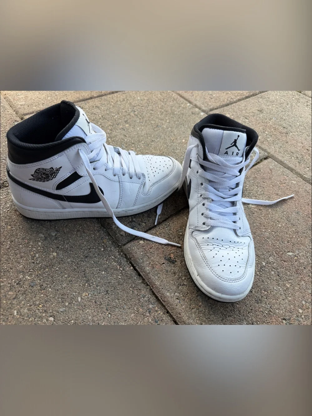 Jordan White and Black High-Top Sneakers